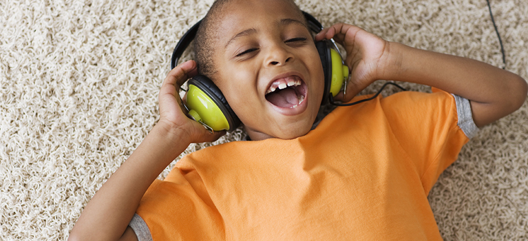 Little Boy Listening to Headphones