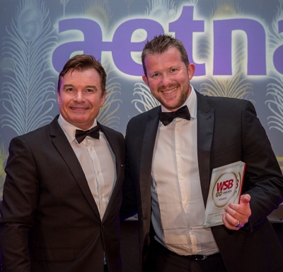 Matt Crudgington, Corporate Sales Director, Europe, (pictured on the right) accepting the WSB award for ‘International Benefits Provider of the Year’ on behalf of Aetna International.