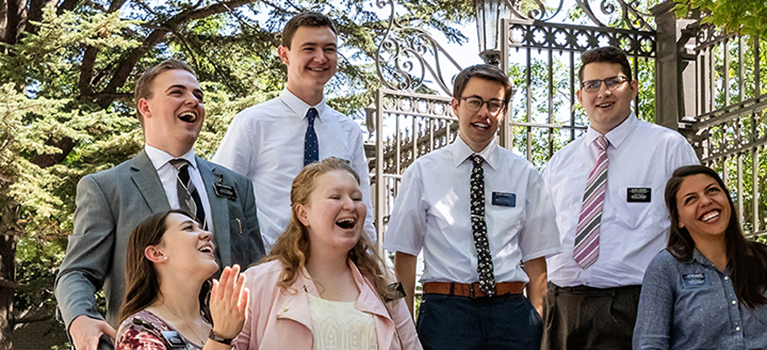 Group of missionaries posing outdoors