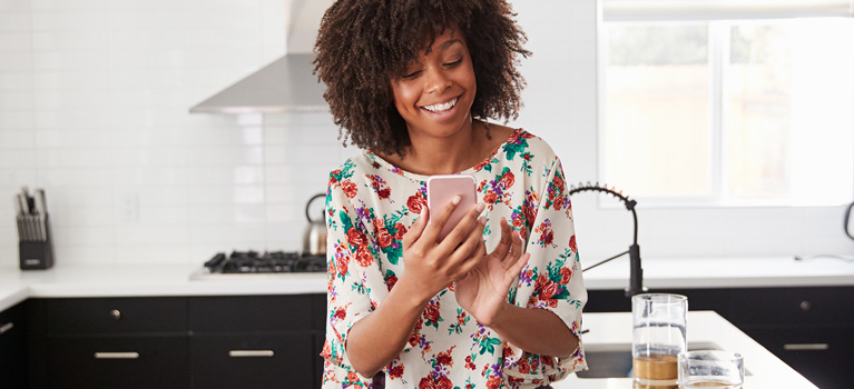 Woman accessing a virtual health session via phone