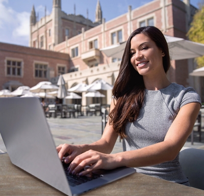 Woman working remotely while living and traveling abroad