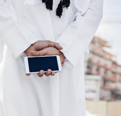 Man holding mobile phone in hands