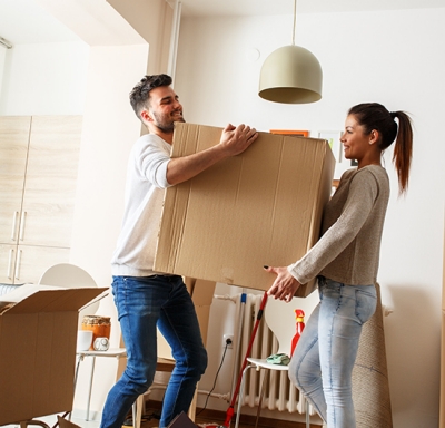 Young couple moving in to a new home