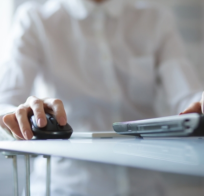 Man typing and working on laptop