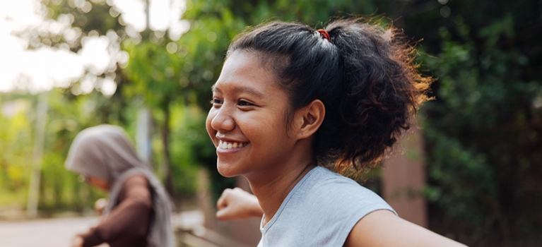 Girl smiling while being outside